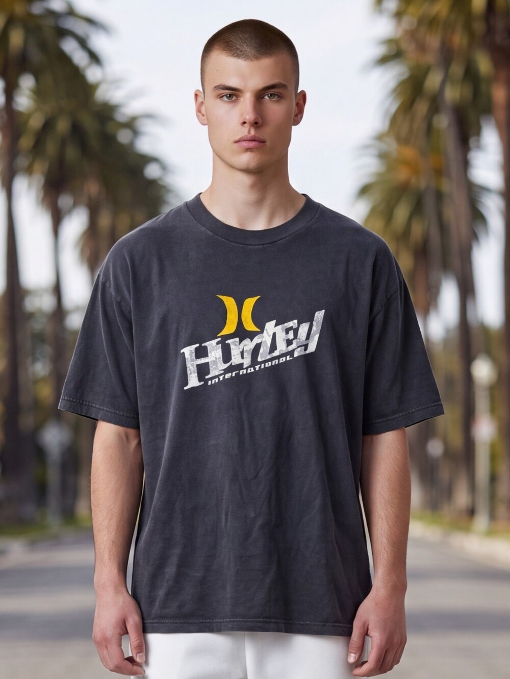 Vintage Hurley Black Short Sleeve Tee with Yellow & White Logo